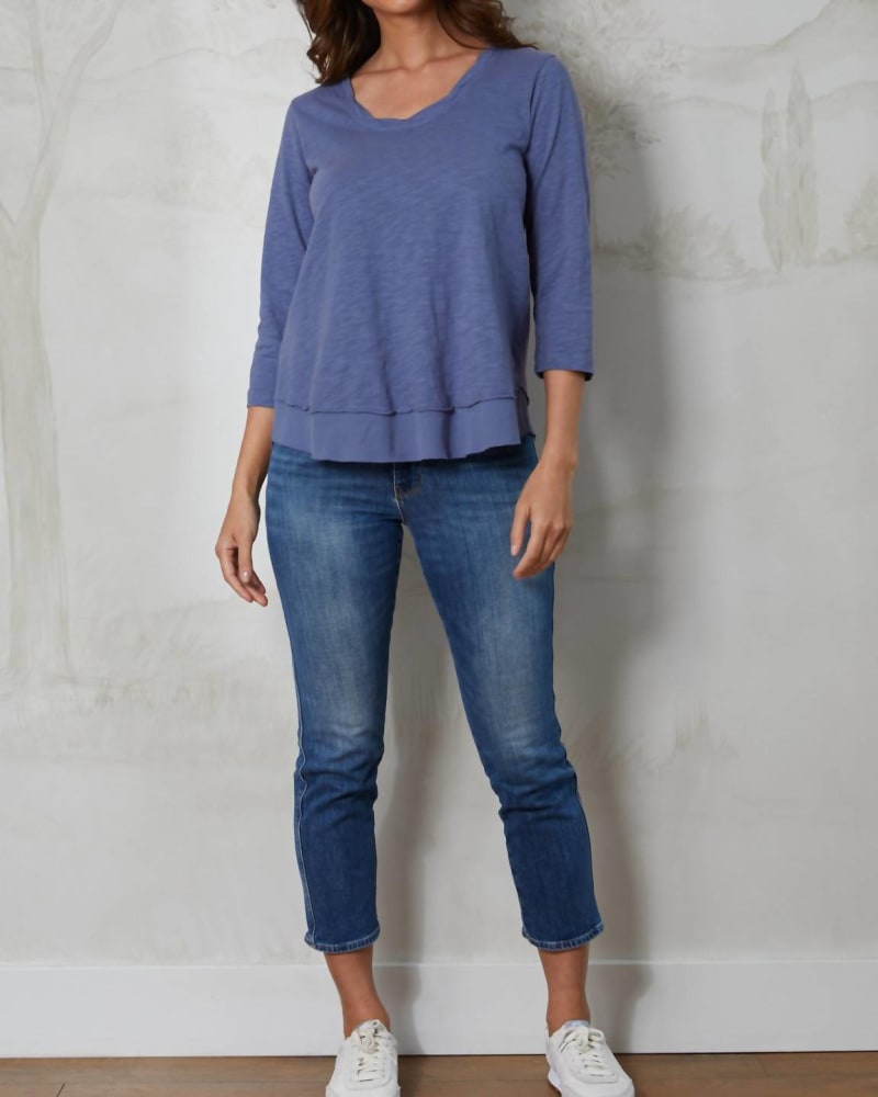 Front of a model wearing a size XL 3/4 Length Sleeve Twist Neck Top in Whirlpool in Whirlpool by mododoc. | dia_product_style_image_id:332508